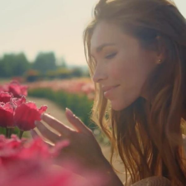 Woman Smelling Flowers - 1